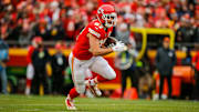 Travis Kelce runs for a first down against the San Diego Chargers in the Chiefs' final game.