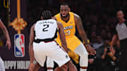 LeBron James guarding Kawhi Leonard