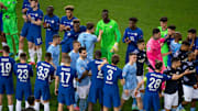Los jugadores de Manchester City y del Chelsea, tras la final de la Champions | Visionhaus/Getty Images
