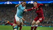 Raheem Sterling y Andrew Robertson
