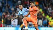 Rafael Da Silva face à Manchester City.