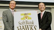 Masayoshi Son (R), president of Japan's
