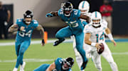 Ryan Fitzpatrick sumó tres touchdowns ante los Jaguars en la Semana 3