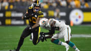 Steelers' running back James Conner runs the ball against the Miami Dolphins on MNF