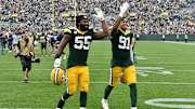 Za'Darius Smith and Preston Smith celebrating a Packers win. 
