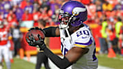 Minnesota Vikings' star corner Mackensie Alexander ruled out prior to pivotal playoff clash.