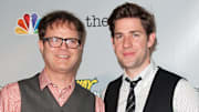 John Krasinski recalls 'Office' co-star Rainn Wilson helping him to get into directing.