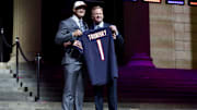 Bears quarterback Mitchell Trubisky holds a jersey and poses with commissioner Roger Goodell after being selected No. 2 overall in the 2017 NFL Draft.