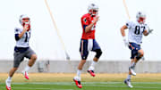 Former teammates Julian Edelman, Tom Brady, and Rob Gronkowski at a Patriots practice 