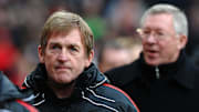 New Liverpool manager Kenny Dalglish (L)