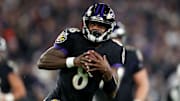 Lamar Jackson tucking and running the ball vs. the New York Jets 