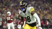 Pittsburgh wideout Diontae Johnson hauling in a reception against the Cardinals. 