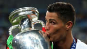 Cristiano Ronaldo kisses the trophy following Portugal's UEFA EURO 2016 win