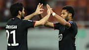Serge Gnabry celebrates his 15th Germany goal with Ilkay Gundogan 