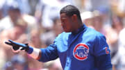 Sammy Sosa of the Chicago Cubs gestures after hitt