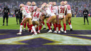 The San Francisco 49ers offensive huddle in a 2019 game against the Baltimore Ravens