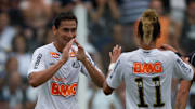 Santos' Paulo Henrique Ganso (L) reacts