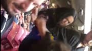 Two fans fight in the stands ruing Sunday's Rams-Cardinals game 