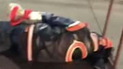 One Bears fan had a little too much to drink, so a second fan helped push him out of the stadium.