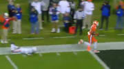 Tee Higgins runs in for a touchdown early in the ACC Championship