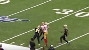 49ers TE George Kittle getting mauled by Saints defenders.