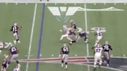 Patriots QB Tom Brady laying a block on Bills CB Tre'Davious White