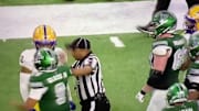 The referee in the Quick Lane Bowl offered up an impressive flop after barely getting touched.