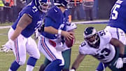 Daniel Jones' costly fumble in the fourth quarters allows Eagles to extend lead.