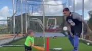 Chicago Cubs INF Javy Baez and his son playing baseball