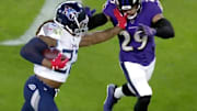 Derrick Henry delivered a stiff arm to Earl Thomas that spun the safety around. 