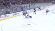 Carolina Hurricanes goalie Petr Mrazek collides with Toronto Maple Leafs' Kyle Clifford in open ice