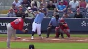 Yoshi Tsutsgo hits a home run for the Tamoa Bay Rays in Spring Training