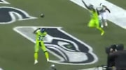 Chris Carson bobbles and catches go-ahead touchdown for Seahawks on Thursday.