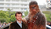 Han Solo actor Alden Ehrenreich and Chewbacca at the 'Solo: A Star Wars Story' premiere.