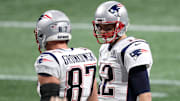 Patriots quarterback Tom Brady, right, stares at tight end Rob Gronkowski during the Super Bowl against the Rams.