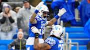Two Kentucky players celebrate a touchdown against Tennessee-Martin