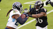 Derrick Henry stiff arm. 