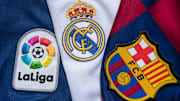 Escudos de La Liga, Real Madrid y Barcelona.