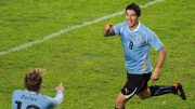 Uruguayan forward Luis Suarez (R) celebr