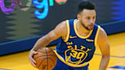 Stephen Curry estuvo ausente en los Warriors por molestias en la espalda