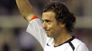 Valencia's Italian Amedeo Carboni waves