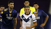 Almada riéndose al jugar frente a Boca.