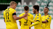 Borussia Dortmund celebrate their second goal.