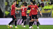 Edinson Cavani celebrates his equaliser with Scott McTominay