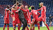 Liverpool celebrate Alisson's winner against West Brom 