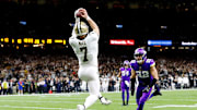 New Orleans Saints "quarterback" Taysom Hill hauls in a touchdown pass vs. the Minnesota Vikings