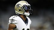 Thomas solamente hizo tres recepciones en el primer juego de la temporada