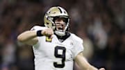 Brees celebrates in a game vs. the Vikings