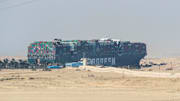 Work Continues To Free Container Ship Stuck In Suez Canal