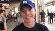 This baseball fan might just like every single MLB team there is.